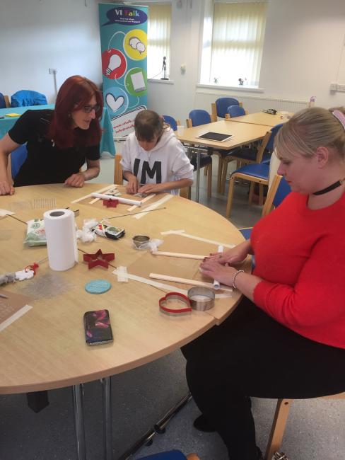 People enjoying making shapes with the air dry clay.